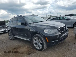 2012 BMW X5 50i with VIN 5UXZV8C51CL424965, listed as a Copart auction lot 64414455 with 121,894 mi miles and Clean title. Bid and sale history available at DreamBid. Image 4.