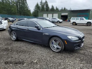 2013 BMW 6 Series 650i with VIN WBA6B2C50DD128242, listed as a Copart auction lot 44441885 with 107,960 mi miles and Salvage Title. Bid and sale history available at DreamBid. Image 4.