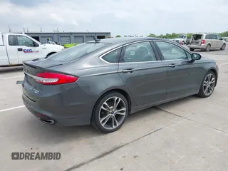 2017 Ford Fusion Titanium with VIN 3FA6P0D93HR261526, listed as a IAAI auction lot 42277350 with 117,388 mi miles and . Bid and sale history available at DreamBid. Image 4.