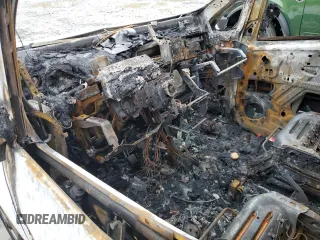 2018 Nissan NV200 SV с VIN 3N6CM0KN3JK699061, выставлен на аукционе Copart как лот 52017285 с пробегом Не указан миль и Списание • Salvage title. История ставок и продаж доступна на DreamBid. Изображение 8.