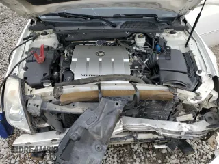 2007 Cadillac DTS Performance z VIN 1G6KD57907U171271, wystawiony jako Copart lot #79007574 z przebiegiem 147 504 mil mil oraz Szkoda całkowita • Salvage title. Historia ofert i sprzedaży dostępna na DreamBid. Obrazek 12.