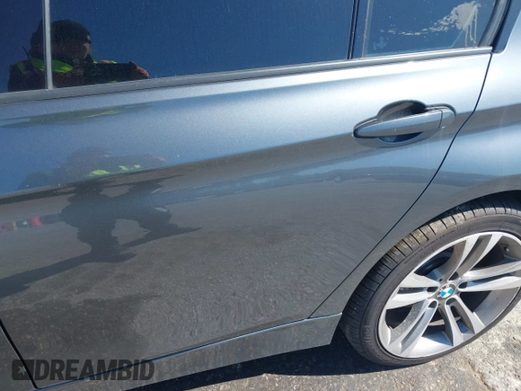 2015 BMW 3 Series 328i xDrive with VIN WBA3B3G5XFNR88682, listed as a IAAI auction lot 39228218 with 102,201 mi miles and . Bid and sale history available at DreamBid. Image 13.