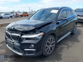 2017 BMW X1 sDrive28i with VIN WBXHU7C3XHP924635, listed as a IAAI auction lot 41744824 with 74,143 mi miles. Bid and sale history available at carsss.com. Image 2.