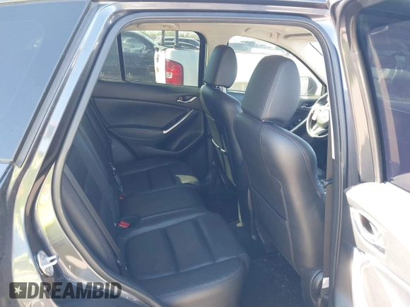 2016 Mazda CX-5 Grand Touring with VIN JM3KE2DYXG0784615, listed as a IAAI auction lot 41846853 with 72,185 mi miles. Bid and sale history available at carsss.com. Image 8.