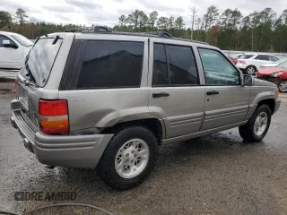 1997 Jeep Grand Cherokee Limited with VIN 1J4GZ78Y0VC682949, listed as a Copart auction lot 82152424 with 194,576 mi miles and Salvage Title. Bid and sale history available at carsss.com. Image 3.