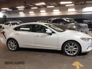 2014 Mazda Mazda6 i Touring with VIN JM1GJ1V68E1147067, listed as a IAAI auction lot 42105878 with 102,684 mi miles. Bid and sale history available at carsss.com. Image 13.