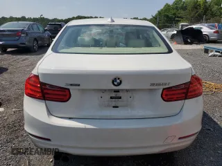 2013 BMW 3 Series 328i xDrive с VIN WBA3B3C52DF533516, выставлен на аукционе Copart как лот 60193335 с пробегом 104 446 миль миль и Списание • Salvage title. История ставок и продаж доступна на DreamBid. Изображение 6.