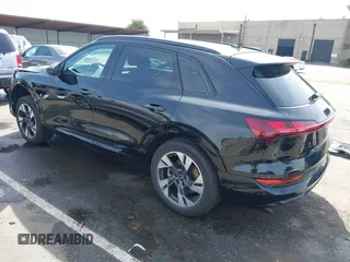 2022 Audi e-tron Premium with VIN WA1AAAGE6NB027461, listed as a IAAI auction lot 41830461 with 25,727 mi miles. Bid and sale history available at carsss.com. Image 3.