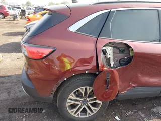 2021 Ford Escape SEL with VIN 1FMCU9H60MUA61602, listed as a IAAI auction lot 42476639 with 81,688 mi miles and . Bid and sale history available at DreamBid. Image 6.