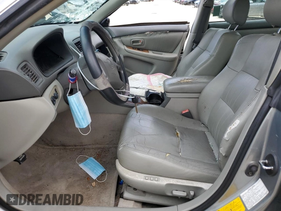 2001 Lexus ES 300 with VIN JT8BF28G615110977, listed as a Copart auction lot 55073025 with 194,948 mi miles and Salvage Title. Bid and sale history available at DreamBid. Image 7.