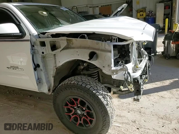 2021 Toyota Tacoma 4WD SR5 with VIN 3TMDZ5BN4MM103311, listed as a Copart auction lot 46486445 with 125,685 mi miles and Salvage Title. Bid and sale history available at carsss.com. Image 11.