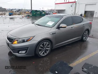 2015 Kia Optima SX Turbo with VIN 5XXGR4A66FG361755, listed as a IAAI auction lot 41199887 with 114,179 mi miles. Bid and sale history available at carsss.com. Image 2.