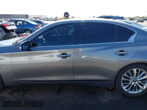2017 Infiniti Q50 Premium z VIN JN1EV7AP5HM733602, wystawiony jako IAAI lot #42334405 z przebiegiem 174 058 mil mil oraz . Historia ofert i sprzedaży dostępna na DreamBid. Obrazek 14.
