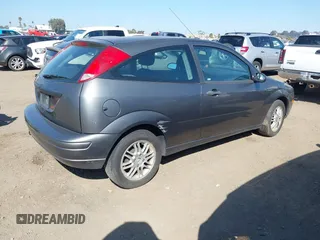 2007 Ford Focus S with VIN 1FAFP31N57W349167, listed as a IAAI auction lot 41858577 with 137,724 mi miles and . Bid and sale history available at DreamBid. Image 4.