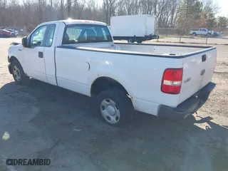 2005 Ford F-150 XL with VIN 1FTRF12285NB41452, listed as a IAAI auction lot 41903892 with 290,233 mi miles. Bid and sale history available at carsss.com. Image 3.
