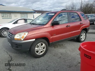 2005 Kia Sportage LX with VIN KNDJE723257052220, listed as a Copart auction lot 86979334 with 113,717 mi miles and Clean title. Bid and sale history available at DreamBid. Image 1.