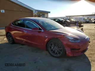 2018 Tesla Model 3 Long Range Battery with VIN 5YJ3E1EAXJF047285, listed as a Copart auction lot 87875175 with 114,896 mi miles and Salvage Title. Bid and sale history available at DreamBid. Image 4.