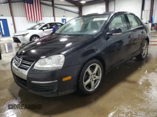 2009 Volkswagen Jetta S with VIN 3VWJM71K99M148169, listed as a Copart auction lot 58192385 with 156,433 mi miles and Salvage title. Bid and sale history available at DreamBid. Image 1.