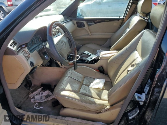 1997 Mercedes-Benz E-Class with VIN WDBJF55F5VJ028552, listed as a Copart auction lot 84172054 with 308,426 mi miles and Clean Title. Bid and sale history available at carsss.com. Image 7.