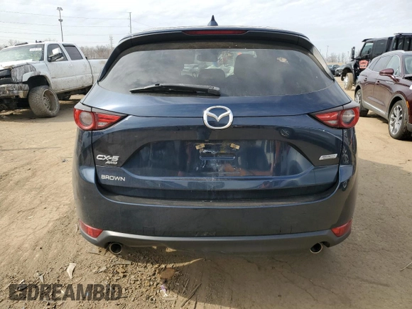 2017 Mazda CX-5 Grand Touring with VIN JM3KFBDL8H0163179, listed as a Copart auction lot 49866865 with 53,066 mi miles and Salvage Title. Bid and sale history available at carsss.com. Image 6.