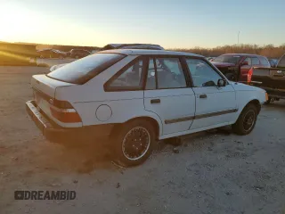 1988 Ford Escort z VIN 1FAPP959XJW370611, wystawiony jako Copart lot #86715994 z przebiegiem 3424 mil mil oraz Tytuł czysty. Historia ofert i sprzedaży dostępna na DreamBid. Obrazek 3.