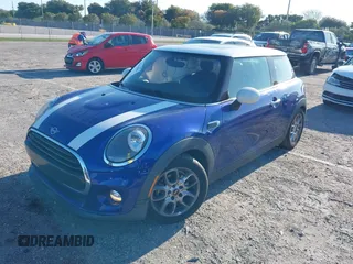 2019 MINI Hardtop Cooper with VIN WMWXP5C52K2H97728, listed as a IAAI auction lot 42026666 with 61,464 mi miles and . Bid and sale history available at DreamBid. Image 17.