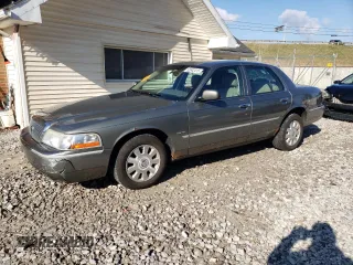 2003 Mercury Grand Marquis LS Premium with VIN 2MEFM75W93X684541, listed as a Copart auction lot 52642415 with 144,114 mi miles and Salvage Title. Bid and sale history available at DreamBid. Image 1.