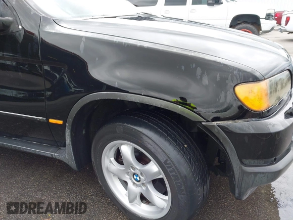 2003 BMW X5 3.0i with VIN 5UXFA53563LW26813, listed as a IAAI auction lot 41873041 with 188,523 mi miles. Bid and sale history available at carsss.com. Image 14.