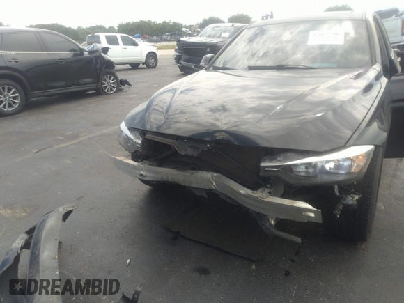 2013 BMW 3 Series 328i with VIN WBA3A5G55DNP26709, listed as a IAAI auction lot 37057796 with 103,168 mi miles and . Bid and sale history available at DreamBid. Image 6.