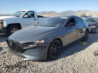 2024 Mazda 3 S Carbon Edition with VIN JM1BPBLM4R1714705, listed as a Copart auction lot 69140474 with 1,808 mi miles and Salvage Title. Bid and sale history available at DreamBid. Image 1.