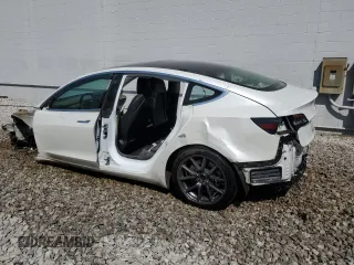 2020 Tesla Model 3 Standard Range Plus with VIN 5YJ3E1EA5LF612626, listed as a Copart auction lot 54421235 with Not Provided miles and Clean Title. Bid and sale history available at DreamBid. Image 2.