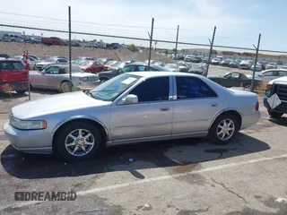 2003 Cadillac Seville Luxury SLS z VIN 1G6KS54Y43U214795, wystawiony jako IAAI lot #42348542 z przebiegiem 144 438 mil mil oraz . Historia ofert i sprzedaży dostępna na DreamBid. Obrazek 14.