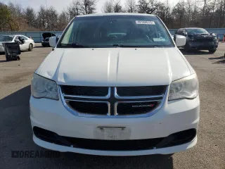 2013 Dodge Grand Caravan SXT with VIN 2C4RDGCG8DR749444, listed as a Copart auction lot 49169515 with 166,104 mi miles and Salvage Title. Bid and sale history available at DreamBid. Image 5.