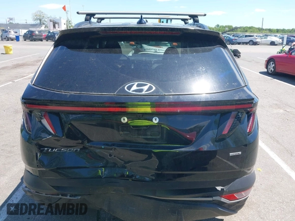 2022 Hyundai Tucson SEL z VIN 5NMJFCAE5NH046879, wystawiony jako IAAI lot #42295125 z przebiegiem 24 448 mil mil oraz . Historia ofert i sprzedaży dostępna na DreamBid. Obrazek 16.
