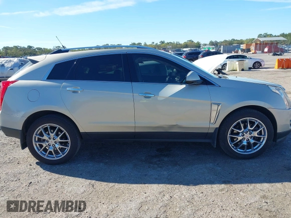 2013 Cadillac SRX Performance Collection with VIN 3GYFNDE39DS654591, listed as a IAAI auction lot 41855098 with 114,965 mi miles. Bid and sale history available at carsss.com. Image 13.
