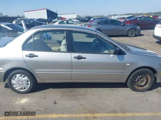 2003 Mitsubishi Lancer ES with VIN JA3AJ26E63U007501, listed as a IAAI auction lot 41771016 with 146,984 mi miles. Bid and sale history available at carsss.com. Image 13.