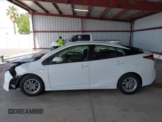 2021 Toyota Prius L Eco z VIN JTDKAMFU5M3146342, wystawiony jako IAAI lot #42249219 z przebiegiem 49 810 mil mil oraz . Historia ofert i sprzedaży dostępna na DreamBid. Obrazek 14.