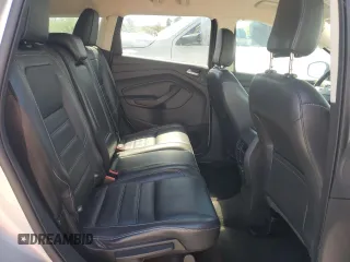2019 Ford Escape Titanium с VIN 1FMCU9J90KUB85595, выставлен на аукционе Copart как лот 57410045 с пробегом 47 995 миль миль и Списание • Salvage title. История ставок и продаж доступна на DreamBid. Изображение 11.