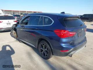 2019 BMW X1 sDrive28i with VIN WBXHU7C54K5L11298, listed as a IAAI auction lot 41662155 with 36,753 mi miles. Bid and sale history available at carsss.com. Image 3.