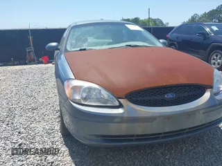 2000 Ford Taurus SE with VIN 1FAFP53U1YG213906, listed as a IAAI auction lot 42064922 with 117,043 mi miles and . Bid and sale history available at carsss.com. Image 6.