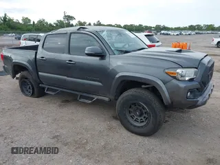 2019 Toyota Tacoma SR with VIN 3TMCZ5AN3KM286159, listed as a IAAI auction lot 42329373 with 53,368 mi miles and . Bid and sale history available at DreamBid. Image 1.