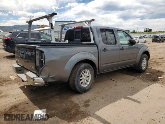 2016 Nissan Frontier Pro-4X with VIN 1N6AD0EV6GN789407, listed as a Copart auction lot 60427635 with 89,909 mi miles and Salvage title. Bid and sale history available at DreamBid. Image 3.