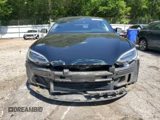2017 Tesla Model S 100D with VIN 5YJSA1E28HF192397, listed as a Copart auction lot 55455995 with 90,534 mi miles and Salvage title. Bid and sale history available at DreamBid. Image 5.