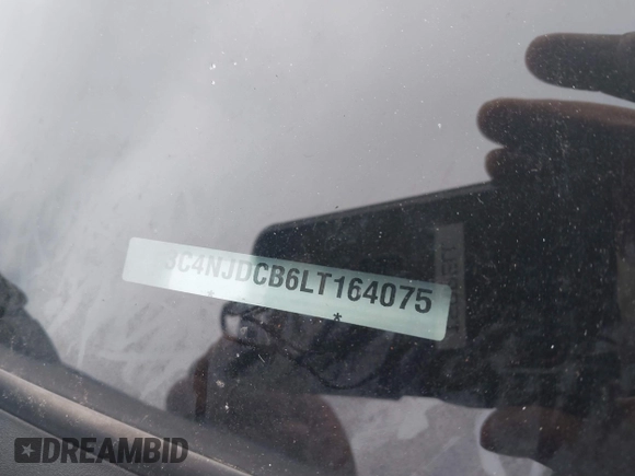 2020 Jeep Compass Limited with VIN 3C4NJDCB6LT164075, listed as a IAAI auction lot 41505470 with 47,196 mi miles and . Bid and sale history available at DreamBid. Image 9.