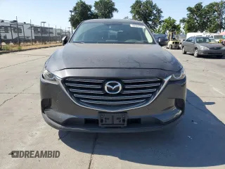 2016 Mazda CX-9 Touring with VIN JM3TCACY1G0108947, listed as a Copart auction lot 58562225 with 86,014 mi miles and Salvage title. Bid and sale history available at DreamBid. Image 5.