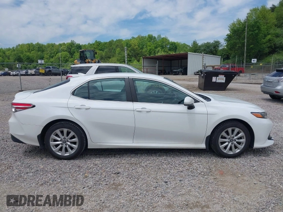 2019 Toyota Camry LE z VIN 4T1B11HKXKU786639, wystawiony jako IAAI lot #42212321 z przebiegiem 82 843 mil mil oraz . Historia ofert i sprzedaży dostępna na DreamBid. Obrazek 13.