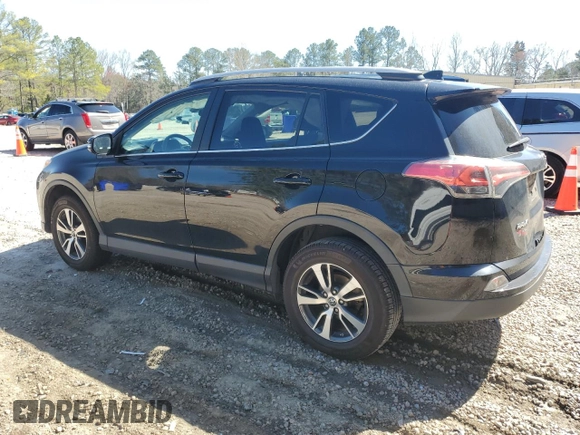 2018 Toyota RAV4 XLE with VIN 2T3WFREV7JW412348, listed as a Copart auction lot 49973215 with 127,661 mi miles and Salvage Title. Bid and sale history available at DreamBid. Image 2.