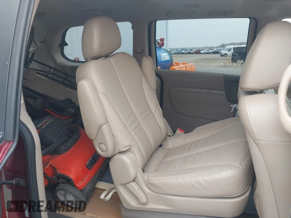 2012 Kia Sedona EX with VIN KNDMH4C76C6463143, listed as a IAAI auction lot 41990970 with 214,045 mi miles. Bid and sale history available at carsss.com. Image 8.
