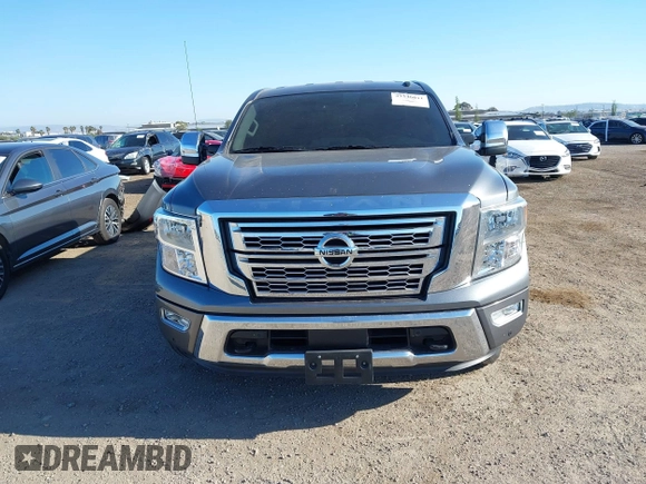 2020 Nissan Titan Platinum Reserve with VIN 1N6AA1EF8LN512582, listed as a IAAI auction lot 42236611 with 18,375 mi miles and . Bid and sale history available at DreamBid. Image 12.