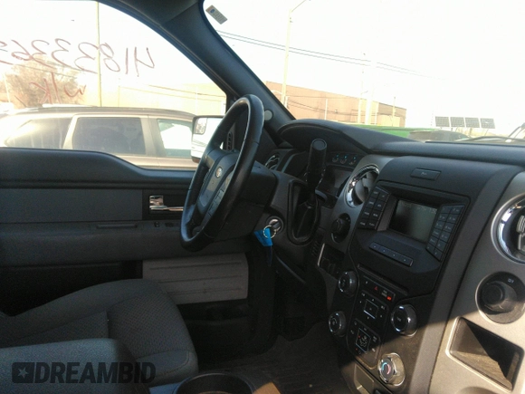 2014 Ford F-150 XL with VIN 1FTFW1ET7EFB56168, listed as a IAAI auction lot 41833365 with 97,720 mi miles and . Bid and sale history available at carsss.com. Image 5.
